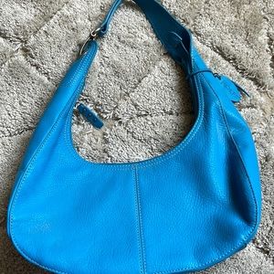 Rolf’s genuine leather handbag